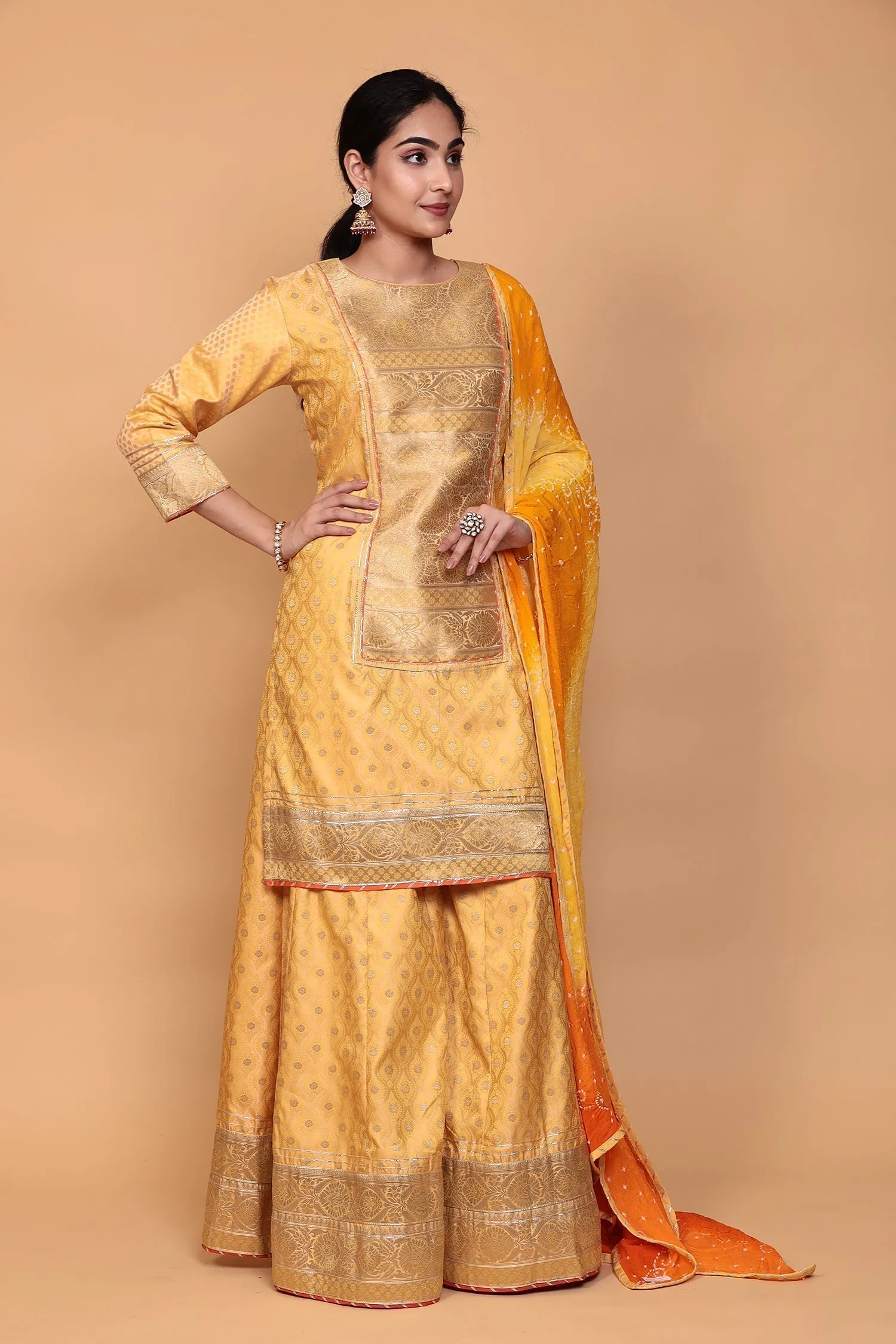 Banarasi Silk Suit with Gota work.