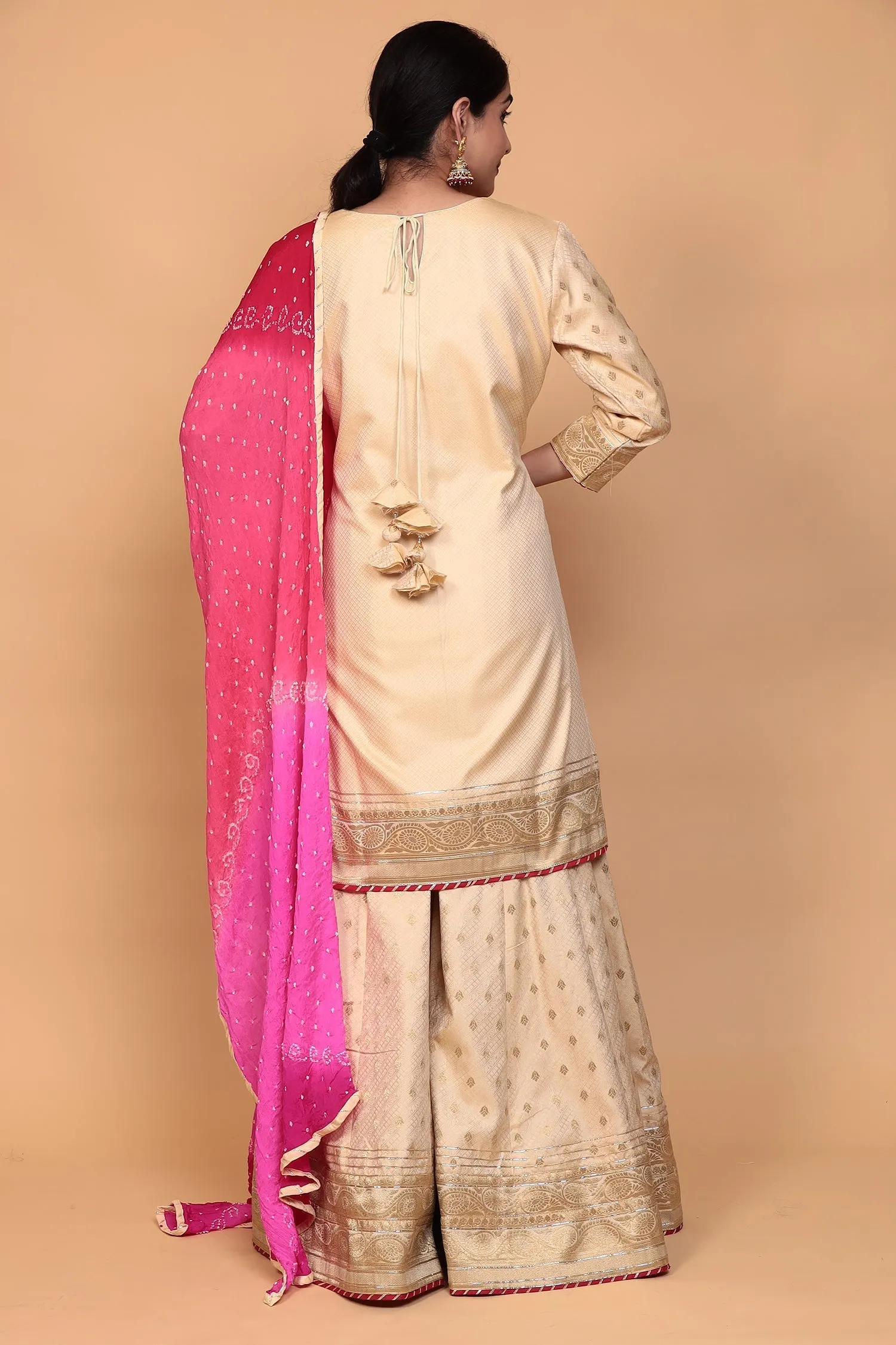 Banarasi Silk Suit with Gota work.