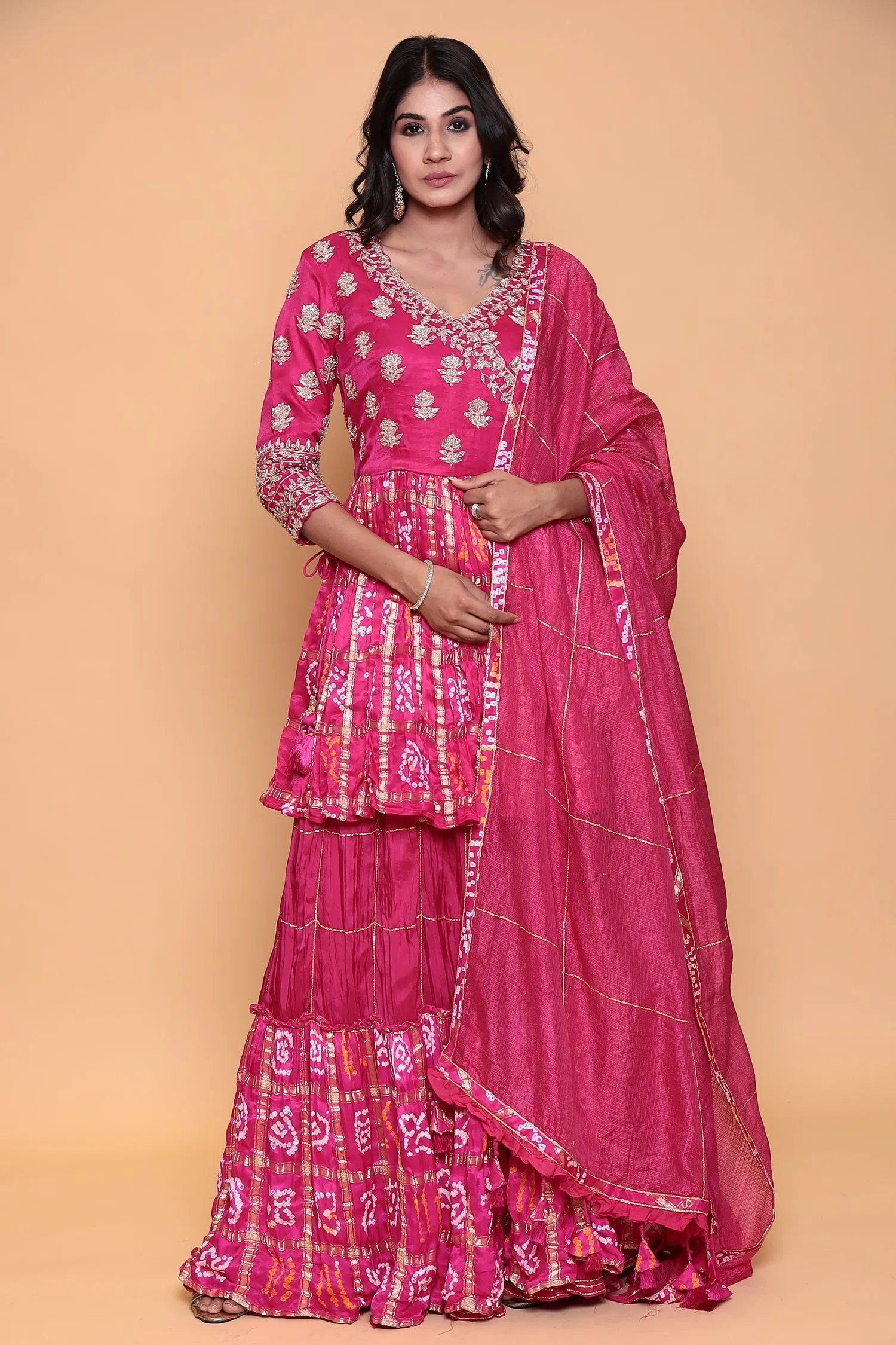 Bandhej ghatchola peplum kurta with skirt and zardozi embroidery.